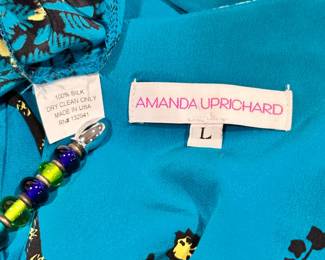 Another view of the Amanda Uprichard 100% silk dress, turquoise blue with flowers and white birds, size L