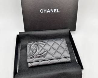 A fine black quilted leather Chanel Cambon Wallet in original packaging, authenticated by Entrupy