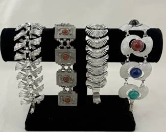 Vintage silver tone link bracelets by Lisner, Ben-Amun, Coro, and Sarah Coventry