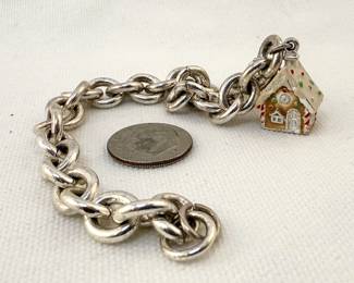 Sterling silver chain link bracelet with silver "gingerbread house" charm