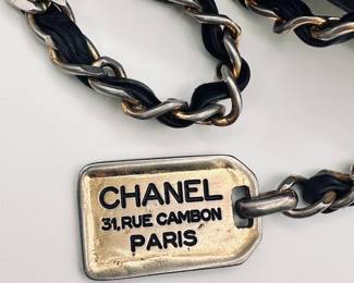Vintage Chanel lambskin Matelassé shoulder bag, navy with plate charm and chain handle; authenticated with Entrupy