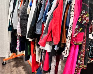 Racks of vintage women's clothing at this Winnetka estate sale