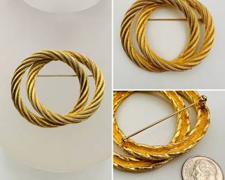 Vintage Dior gold tone double circle brooch