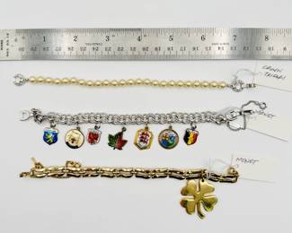 Bracelets - faux pearls, stylized link, and charm bracelets from Crown Trifari and Monet