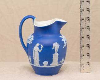  A very nice Wedgwood early to mid-1800s blue dip jasper ware small pitcher or creamer skillfully sprigged with white classical mythology figures, impressed WEDGWOOD mark and indistinct potter's mark to the base.