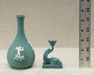 A Wedgwood teal green jasperware vase and a miniature 3-inch-high dolphin candlestick holder