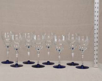 A set of eight Louie-Weston Starflower optic cobalt blue foot water goblets, 1920s-1940s