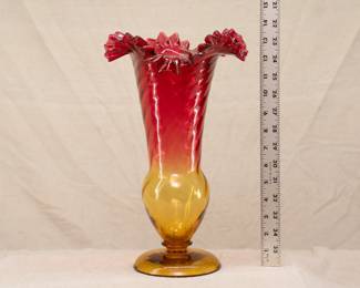 A beautiful 13-1/2 inch hand blown amberina glass vase with double crimped flaring rim and disc foot