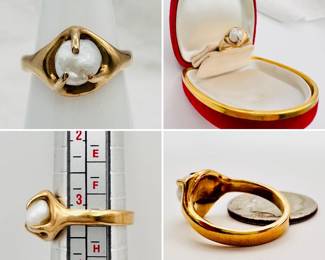 A lovely natural saltwater baroque pearl ring set in unmarked yellow gold.  Size 3 3/4
