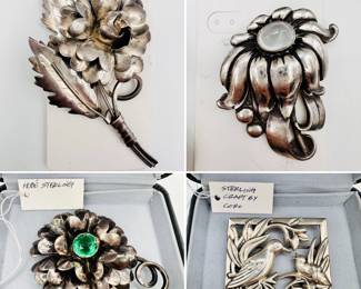 Closeup view of some of the sterling silver brooches from Coro, KBN, Danecraft, Hobé, Viking Craft and more – some with matching earrings