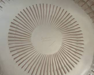 Closeup of the signed Lalique France Marguerites bowl in pale gold brown crystal, 13 inches wide, etched Lalique France on the base