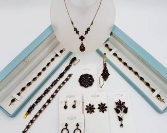 Some of the garnet jewelry available at this sale - bracelets, pendant necklaces, earrings, floral form brooches in both traditional cuts and rose cuts!