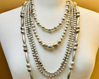 A sampling of the various sterling silver beaded necklaces that we are offering.