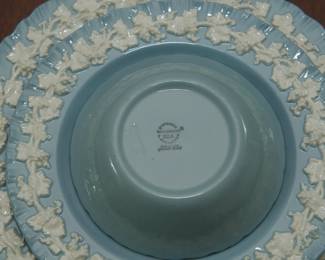 Closeup of the group of Wedgwood Embossed Queensware white vine on blue shell edge china, service for eight, also includes coffee pot, tea pot, creamer and sugar