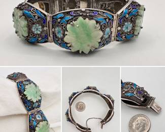 A filigree metal, enamel and carved stone bracelet with safety chain
