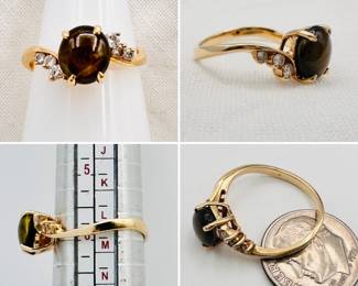 A lovely natural star sapphire and diamond ring set in 14-karat yellow gold.