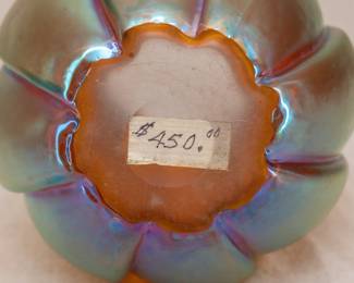 (Please note this photo includes an old price tag from when our client originally purchased the piece, and does not reflect the current sale price.) 