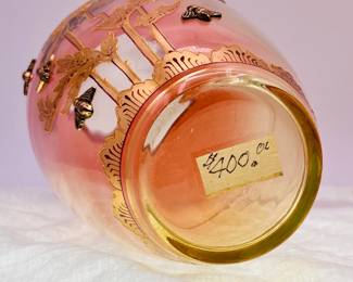 (Please note this photo includes an old price tag from when our client originally purchased the piece, and does not reflect the current sale price.) Another view of the exquisite Bohemian glass vase, shading warm pink to clear, hand painted with gold floral design and applied gold metal bees! Moser glass works produced this stunning Art Nouveau era art glass vase.
