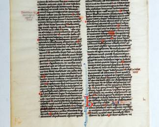 (This is the reverse view of leaf shown in the previous image.) Illuminated manuscript page from a "Leber Bible," circa 1230-1240. "Ordinary Leaves No. 2 Folio 447, interesting flourishes top recto of text." Verso has prologue to Daniel, recto has "Daniel in the Lion's Den". Page is from bible created in the Leber Atelier, Paris.