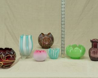 Art glass including a hand blown ruby red and gold  Jugendstil design rose bowl, a peachblow glass rose bowl, and an amethyst glass rib optic vase