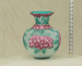 A signed Kelsey Pilgrim cameo glass vase – visually stunning color and pattern bulbous vase, bright magenta flowers bloom with green leaves to body and at collar. Signed with artist's signature, numbered 900749, 7/10, and date of 1990. 