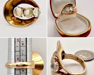 A very 1940's "Moderne" style ring set with three lovely cabochons of opal set in 14-karat yellow gold.