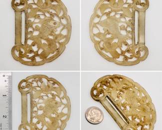 A Chinese carved pierced hard stone belt piece, koi fish and flowers motif