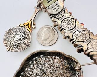 Another view of the Konstantino Treasures 18k gold and sterling silver multi-gem brooch, and a Konstantino Treasures 18k gold and sterling silver bracelet with Amphitrite or moonstone cabochons