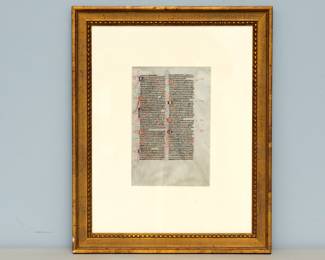 A framed page from the The Biblia Sacra Latina (21.2 x 14.5 cm) written in brown ink in a neat, highly compressed quadratus Gothic bookhand in 49 double-columned lines per side on thin, smooth, cream-colored vellum. It was produced by the “Alexander atelier” in Paris, between 1220-1230. Recto: psalms 124-131, vulgate numbering, Verso: psalms 132-138, vulgate numbering