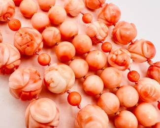 Closeup of the carved coral bead necklaces