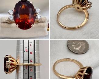 Gorgeous ring! A cognac colored oval citrine with great saturation flanked by pairs of diamonds in a raised basket setting in 14-karat yellow gold.
