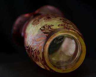 Closeup of the beautiful French art glass by Val St. Lambert, circa 1897, acid etched cranberry cameo glass in delicate seaweed motif.