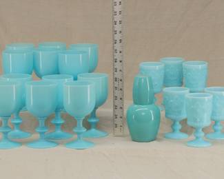 Rare French blue opaline glass from the 1930s: A set of 11 Portieux Vallerysthal goblets, the Turquoise color derived from copper mined in the northeast of France; and a set of 6 Portieux Vallerysthal opaque blue patterned glass goblets. Also an opaque blue glass water carafe with glass.