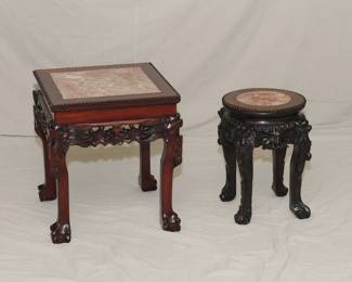 Carved Chinese stands or low tables with inset marble tops.