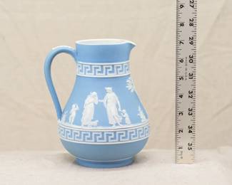 A rare antique Wedgwood blue or "lavender" dip jasperware Etruscan jug, decorated with classical figures between two single line Greek key meander bands.  