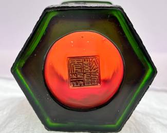 Base of the vintage Chinese Peking Glass bitong or brush pot, hexagonal form, featuring dark green over red cameo glass carved in a birds and flowering peony design