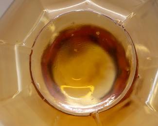 Closeup of vintage Tiara exclusive Indiana Glass Company Amberina  glass 8-sided vase with ruffled flared rim