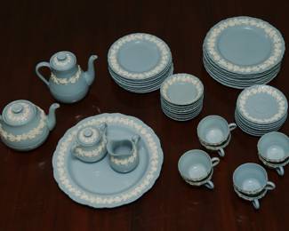 Another view of the group of Wedgwood Embossed Queensware white vine on blue shell edge china, service for eight, also includes coffee pot, tea pot, creamer and sugar
