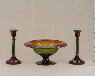 A fabulous Art Deco period console set by Cambridge Glass circa 1920s-1930s, comprised of a Honeycomb pattern footed bowl in Rubina glass with a matching pair of candlesticks. 
