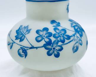 Another view of the antique Harrach or Thomas Webb & Sons cameo glass vase circa 1890, cased blue over creamy white, cameo cut around the body with flowering petals on leafy vines. A banded blue rim at the top and a polished pontil on the base.