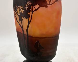 Another view of the Daum Nancy cameo glass vase decorated with sailboats on a lake seen through trees, in purple/black on an orange and yellow ground, acid etched, signed in cameo 'Daum Nancy' with the Croix de Lorraine mark