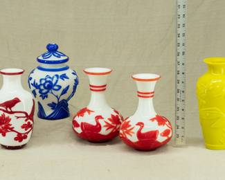  Peking Glass / Beijing Glass vases, decorated in cameo glass style with carved deep red or blue overlay on white ground in scenes of birds and flowering plants; and a Peking Glass vase in opaque yellow glass 