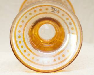 Closeup of the Art Deco era amber cut to clear art glass vase with roses and lily of the valley floral motif (Please note this photo includes an old price mark from when our client originally purchased the piece, and does not reflect the current sale price.)