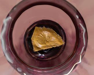 Closeup of Art Deco era Carder Steuben Glass console set, transparent amethyst glass optic ribbed large bowl and pair of candlestick holders