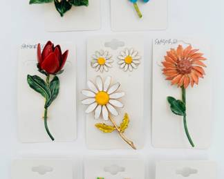 Enamel flower brooches and earrings, Sandor Co roses, camelias; small sculptural yellow roses and orange pansies