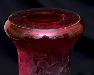 Closeup of the incredible 15-inch tall art glass vase shading from clear to cranberry, beautifully wheel cut or engraved with detailed scene of birds in flight amidst flowering branches and vines. Possibly Moser Glass.