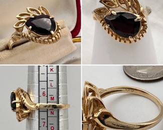 A vintage pear shaped garnet ring set in 14-karat yellow gold