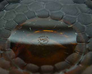 Closeup of the base of the Art Nouveau cameo glass amber tulip vase made by English glassmakers Thomas Webb & Sons