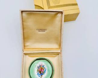 An antique silver and mint green guilloche enamel compact case in original box from C. D. Peacock Chicago