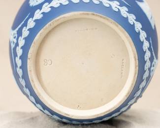 Another view of the small, Wedgwood, blue jasper dip pitcher decorated with classical figures and ornamentation